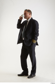 Jake Perry Pilot Drinking Coffee drinking standing whole body 0007.jpg